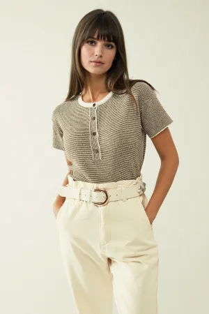 sweater with khaki stripes and gold button closure