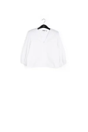 White V-neck top with puffed sleeves