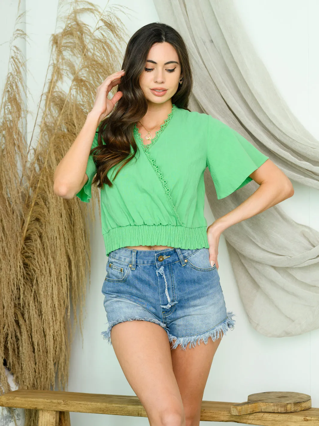 WOMEN'S SHORT SLEEVE SURPLICE SMOCK TRIM TOP